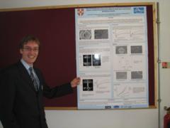 Tim presenting his poster at the Bradford muPP2 meeting