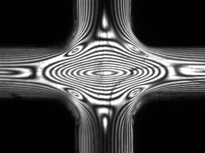 Cross-slot Optical birefringence pattern from polyethylene