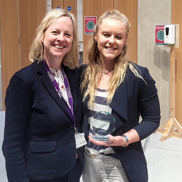 Sarah Barron and her supervisor, Roisin Owens, with Sarah's award trophy