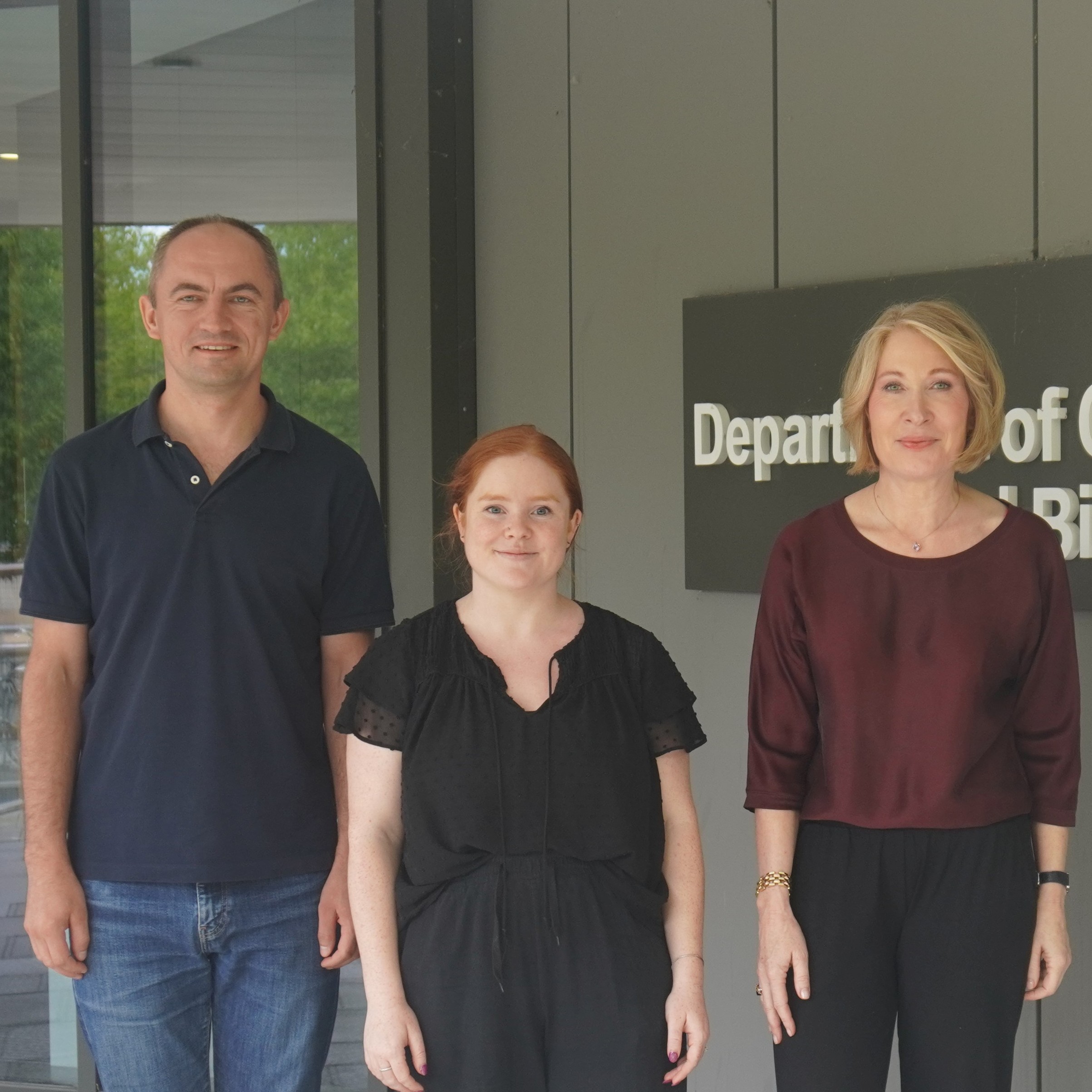 Senior research associate Jakub Tomasik, lead author Erin Funnell and research group leader Prof Sabine Bahn outside the CEB building.