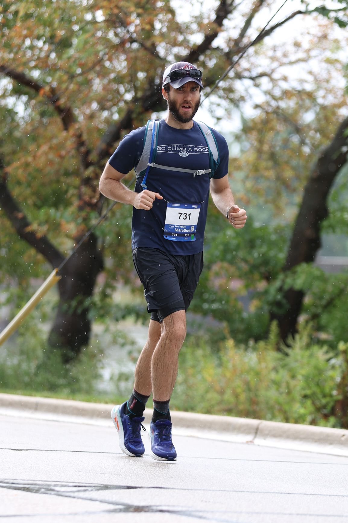 Collin in running gear with an official race number on