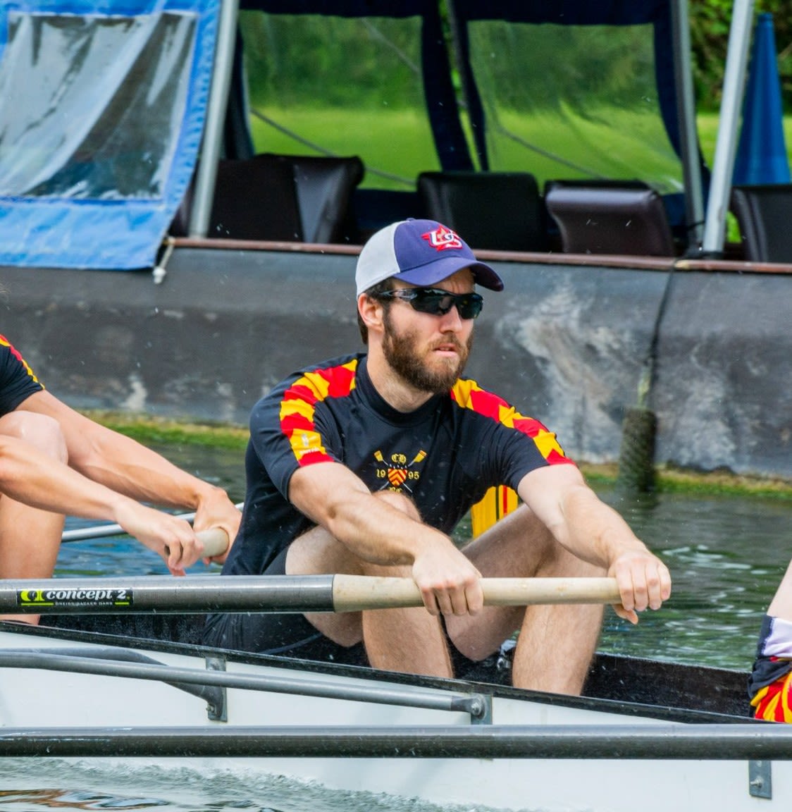 Collin rowing in his Clare College colours