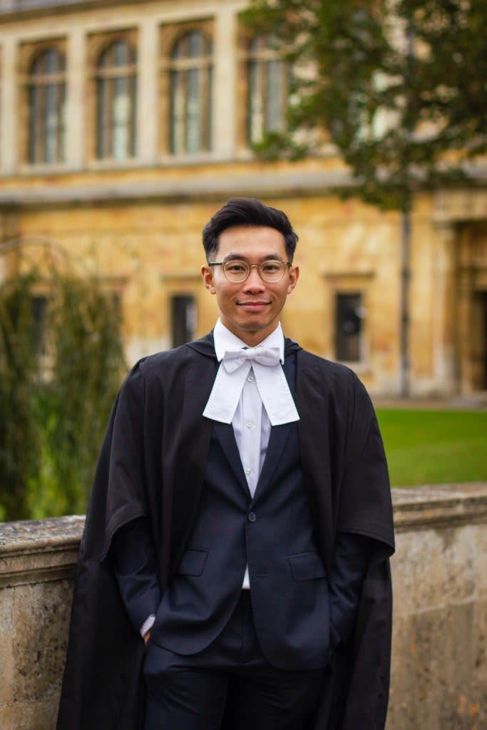 Muhamad Hartono in his graduation academical dress