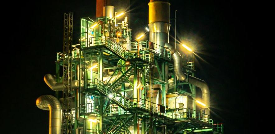 Chemical production plant in Germany illuminated at night