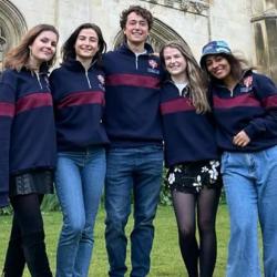 The five members of the CardiaTec team standing in front of King's College Cambridge