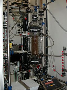 The pilot plant distillation column (50 mm diameter and 4 m height with 40 bubble cap trays or alternatively operated with packings) for the study of the thermal and fluid behaviour in distillation column (by Klaus Baldermann)