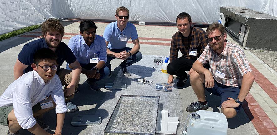 The team of researchers testing their artificial leaf array on the rooftop of the Maxwell Centre in Cambridge