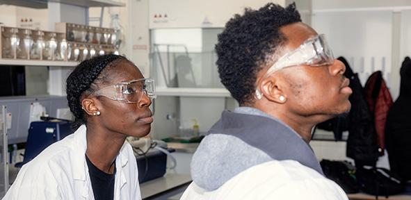 Two undergraduate students working in the teaching laboratory